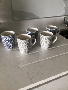 Set of 5 matching newgrange mugs