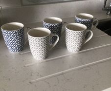 Set of 5 matching newgrange mugs