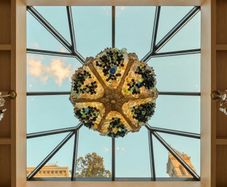 Very nice old large brass and coloured chandelier.