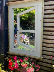 Garden mirror reflection window