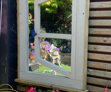 Garden mirror reflection window