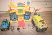 Paw patrol jungle temple with truck figurines and others.