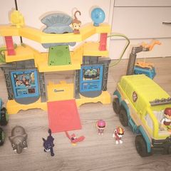 Paw patrol jungle temple with truck figurines and others.
