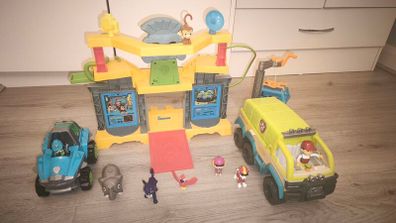 Paw patrol jungle temple with truck figurines and others.
