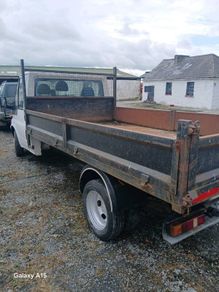 Tipper body for a pickup