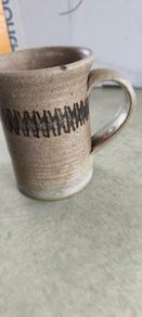 One ceramic mug manufactured by the Irish studio pottery Dun Caoin.