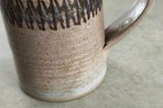 One ceramic mug manufactured by the Irish studio pottery Dun Caoin.