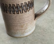 One ceramic mug manufactured by the Irish studio pottery Dun Caoin.