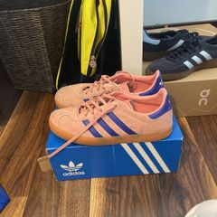 Pink and blue adidas gazzelles