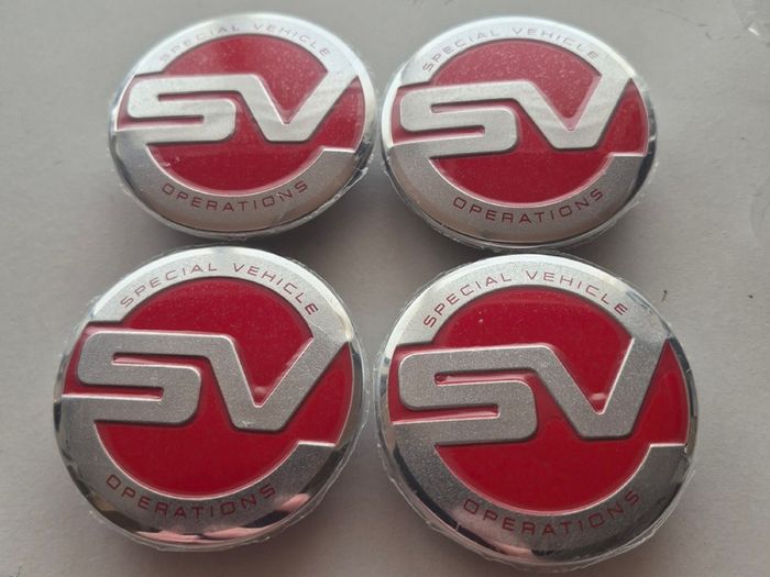 4 x Land Rover Special Vehicle Centre caps.  FREE POST