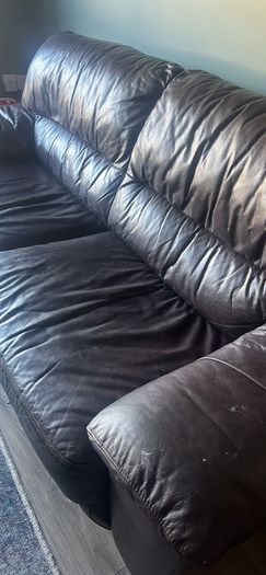 Dark brown leather sofa