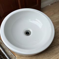 Handbasin and taps