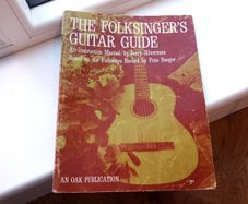 The folksiger's Guitar guide songs book/instruction manual by Jerry silveman