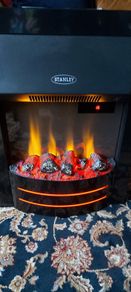 Black Stanley Electric Stove Fire