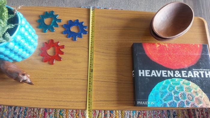Unusual and Practical Mid-Century Modern Wooden Coffee Table with a Hard-Wearing Wood-Patterned Melamine Top and Slatted Magazine Shelf