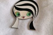 pendant of girls face.