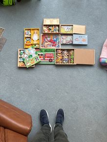 Jigsaw puzzles and magnetic dress up toys