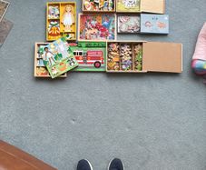 Jigsaw puzzles and magnetic dress up toys
