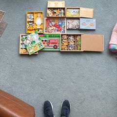 Jigsaw puzzles and magnetic dress up toys