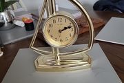 Clock in the shape of a sailboat
