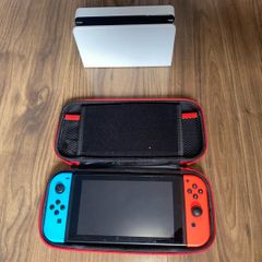 Nintendo switch with Games,case and Docking station + controller holder + Charger