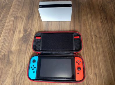 Nintendo switch with Games,case and Docking station + controller holder + Charger