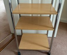 3 shelf wood and metal trolley on wheels.