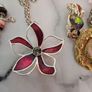 little  collection of broches,a chain and a charm  bracelet Image 5
