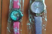 2 womans watches with leather straps