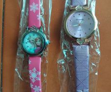 2 womans watches with leather straps