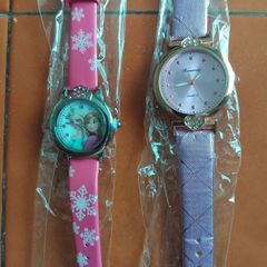 2 womans watches with leather straps