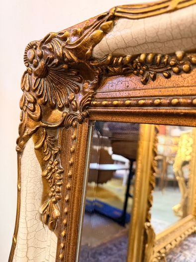 Parcel Gilt and Painted Bevelled Glass Mirror