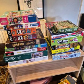 Selection of family board games and jigsaws