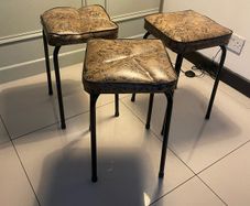 Three Mid century Wells Fargo topped Stools