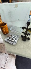 Vintage glass kraft square butter cheese dish lid glass Insert 15.00 euro.Vintage Pasabahce clear glass butter dish 24.00 euro, Fleur De Lis Cast Iron Door Stop Wedge Antique gold Black 4x3.5x7.75 Inch 34.00 euro , Vintage Englshe browne larg milk jug 18.