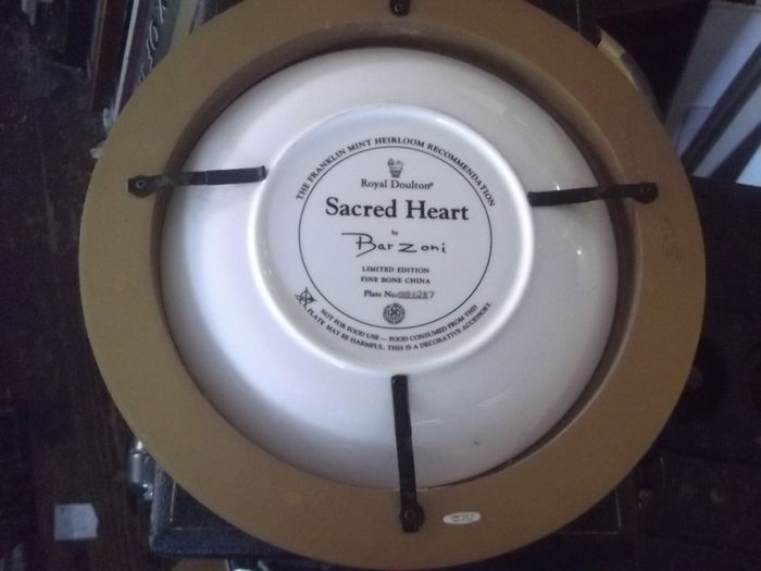 a royal doulton sacred heart plaque