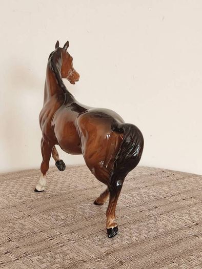 Vintage Royal Doultot porcelain horse. new in the box.