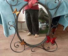 mirror with butterflies in cast iron