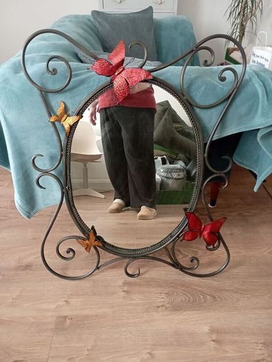 mirror with butterflies in cast iron