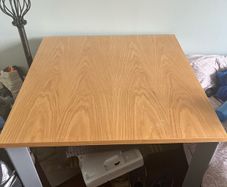Office desk. Solid wood top with metal legs.