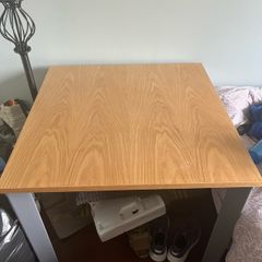 Office desk. Solid wood top with metal legs.