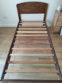 solid dark wood single bed frame