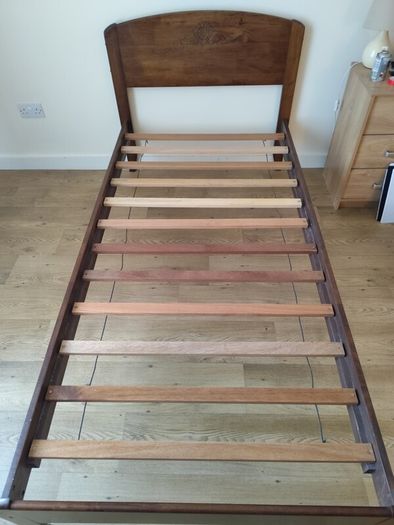 solid dark wood single bed frame