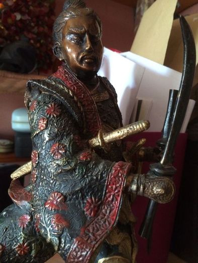 A fine bronze of a samurai signed  MIYAO
