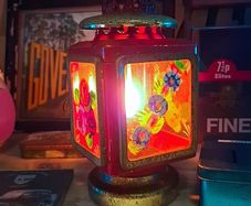 Vintage paraffin lantern with hand painted glass