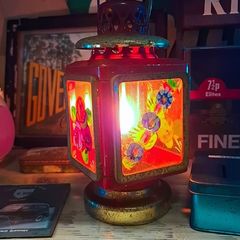 Vintage paraffin lantern with hand painted glass