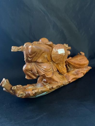 Vintage Maitreya Buddha figure carrying money bag