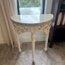 ornate half-moon console table with a granite top Image 5
