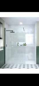 Merlyn 900 wetroom panel matt black finish