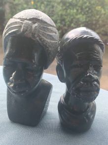 2x Tribal carved stone heads